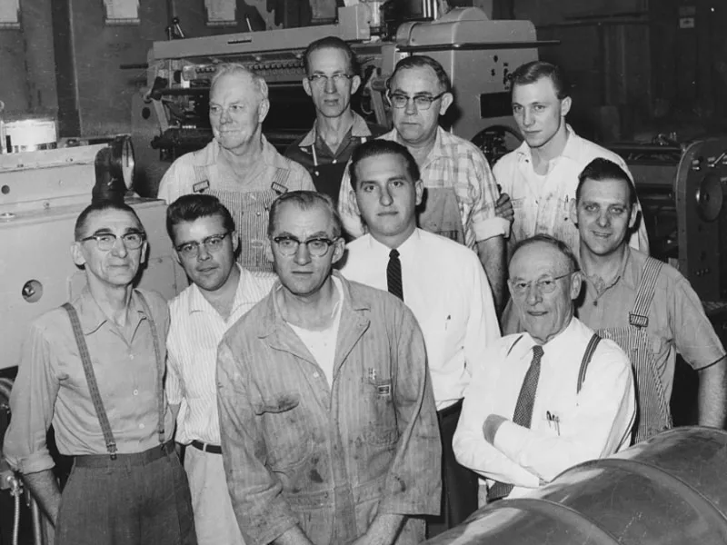 Thomas S. Monson surrounded by employees of the Deseret News Press, ca. 1950 (Photographer unidentified)